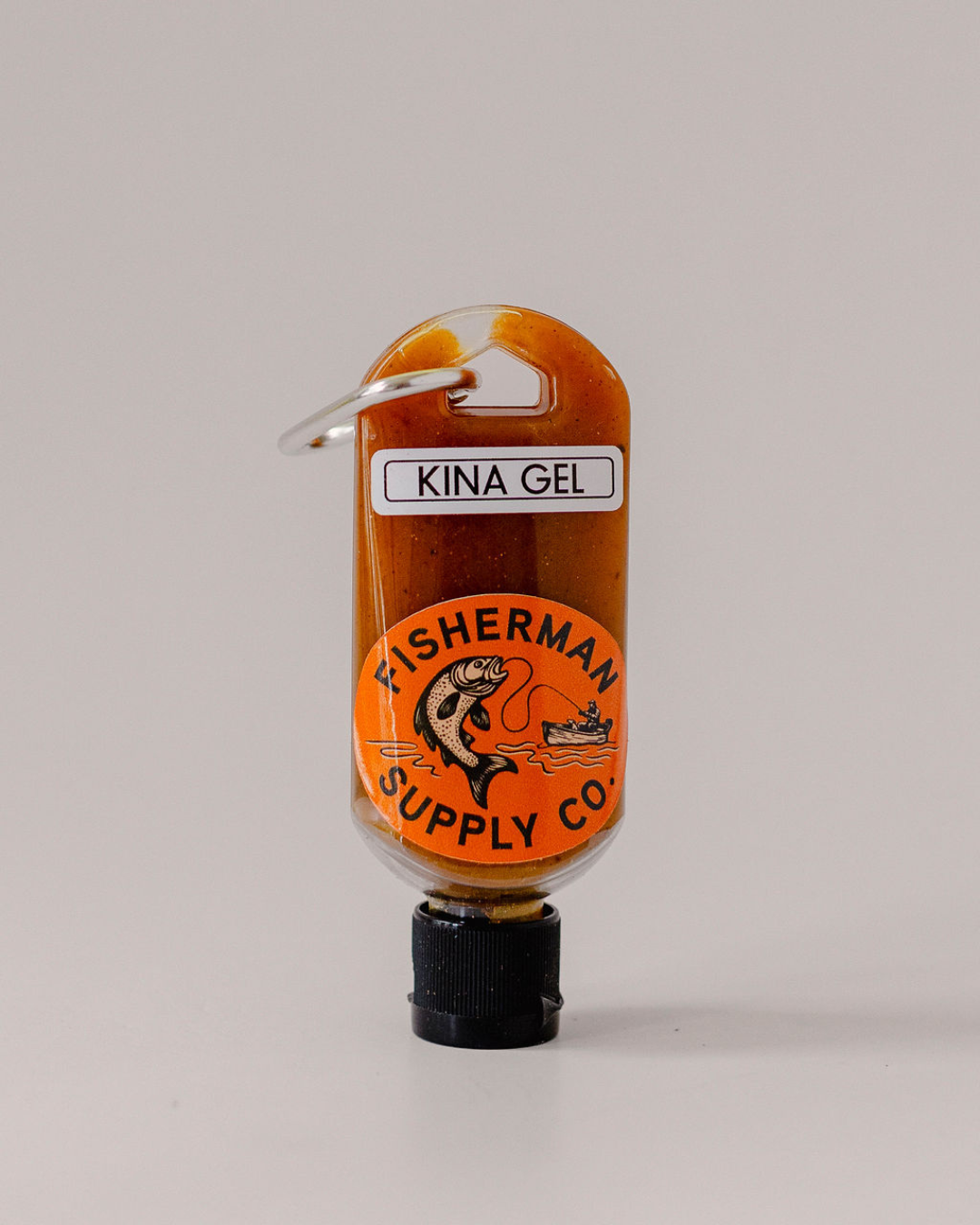 Bottle of Kina Gel by Fisherman Supply Co on a gray background